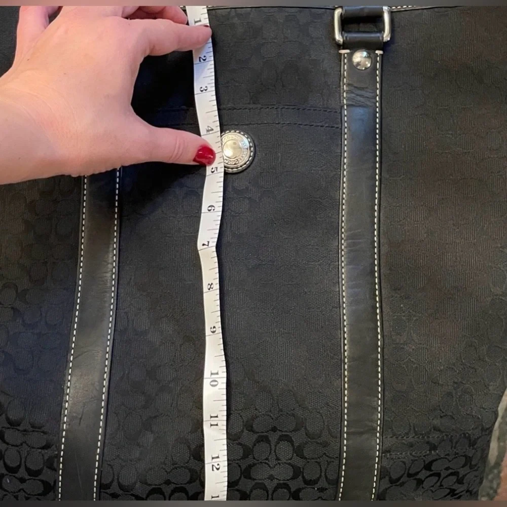 Coach travel Signature tote black featuring monogram canvas and leather 2009